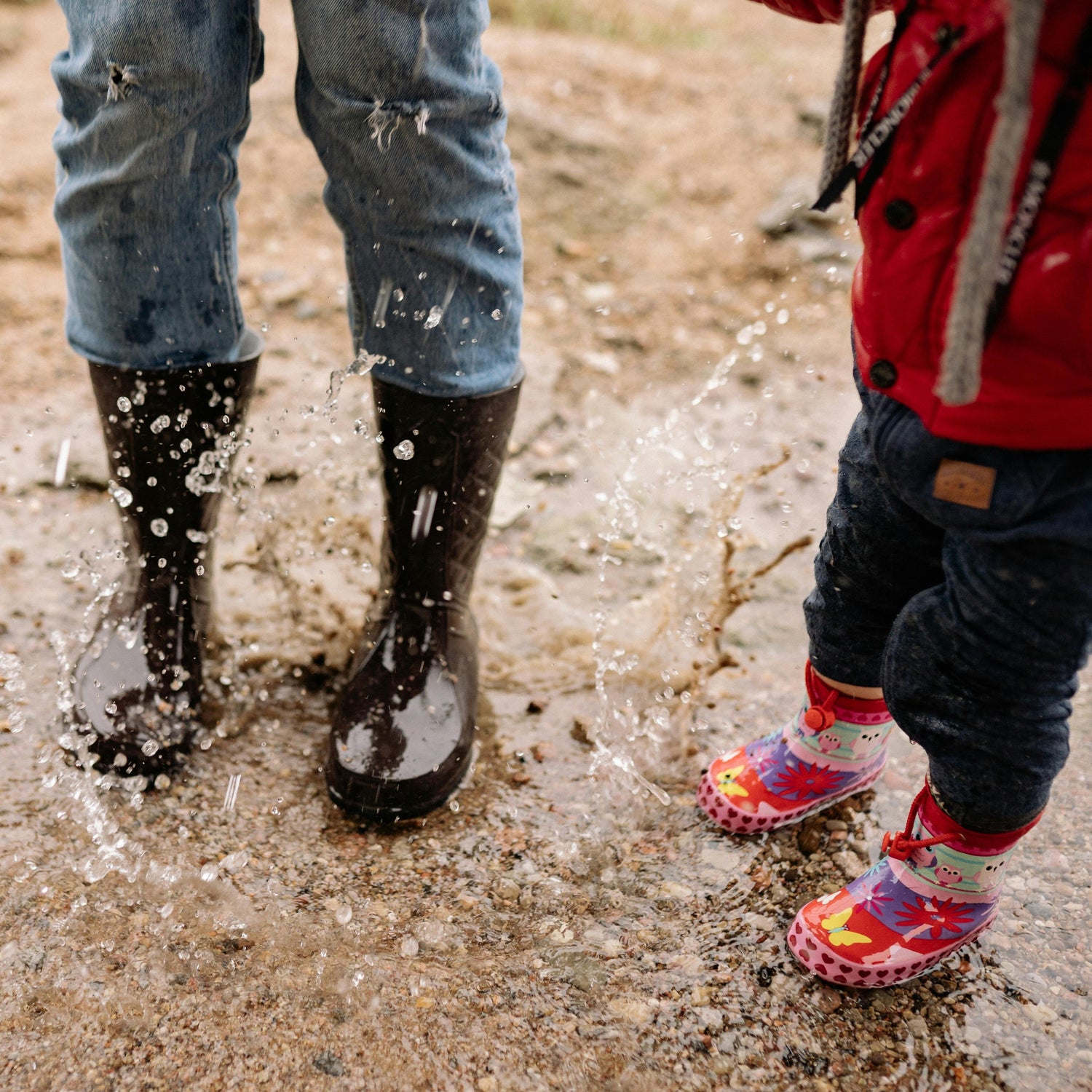 Kids splashing in mud puddles