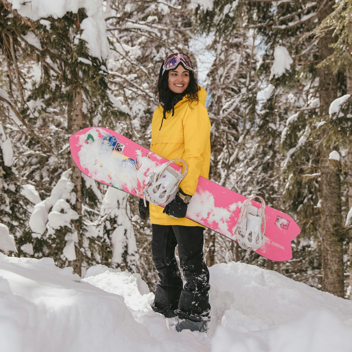 Person holding a snowboard